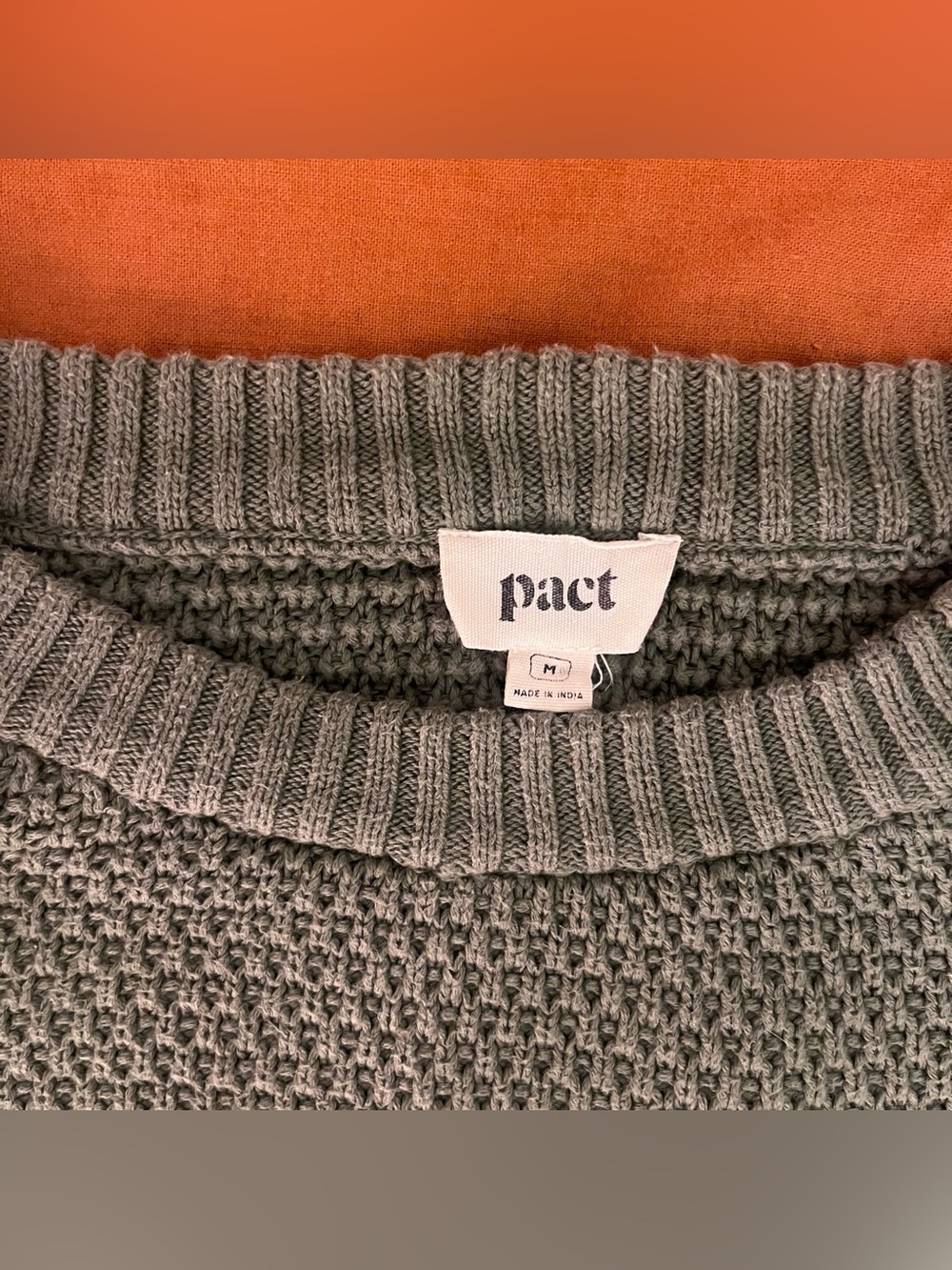 green PACT cozy sweater